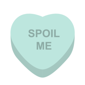A conversation heart that says "Spoil Me."